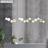 Contemporary Gold Metal Island Pendant Light With Glass Sphere For Dining Table