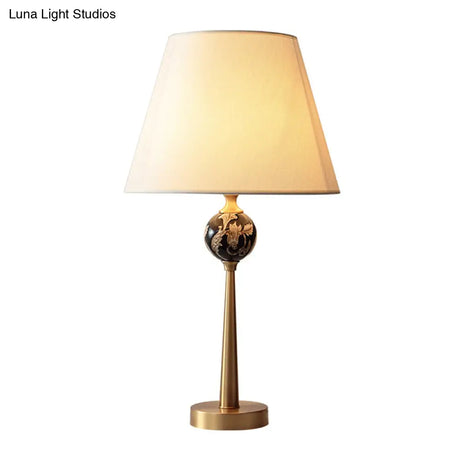 Contemporary Sphere Patterned Ceramic Table Light With Bronze Nightstand Lamp And Fabric Shade