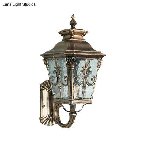 Country Brass Outdoor Wall Sconce With Pointed Flower Design