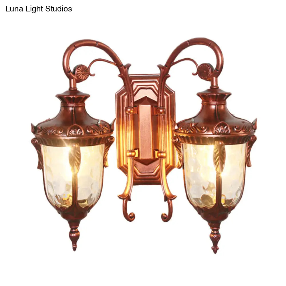 Countryside Black/Gold-Copper Urn Wall Sconce Light With Clear Glass - 2 Bulbs