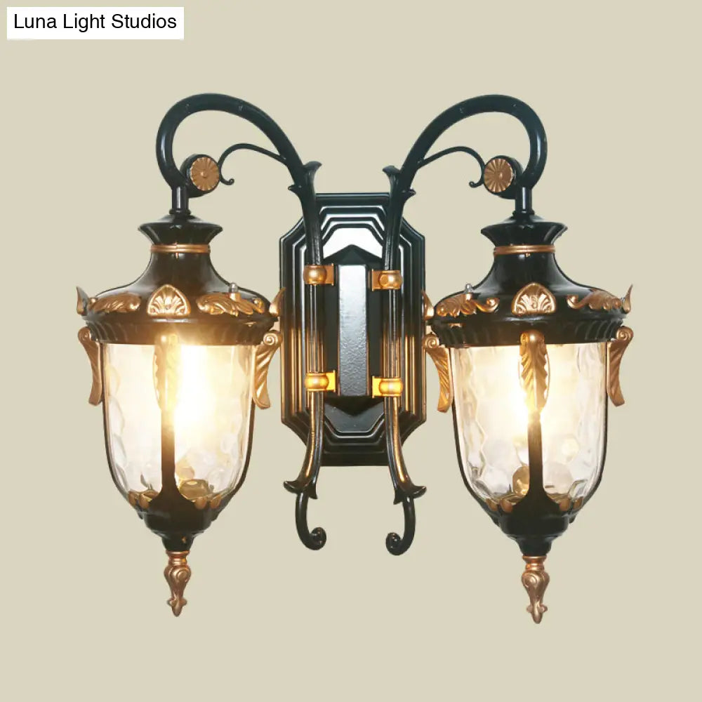 Countryside Black/Gold-Copper Urn Wall Sconce Light With Clear Glass - 2 Bulbs