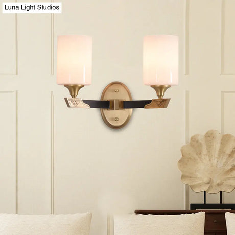 Cylindrical Wall Lamp With Traditional Black And Gold Design White Glass