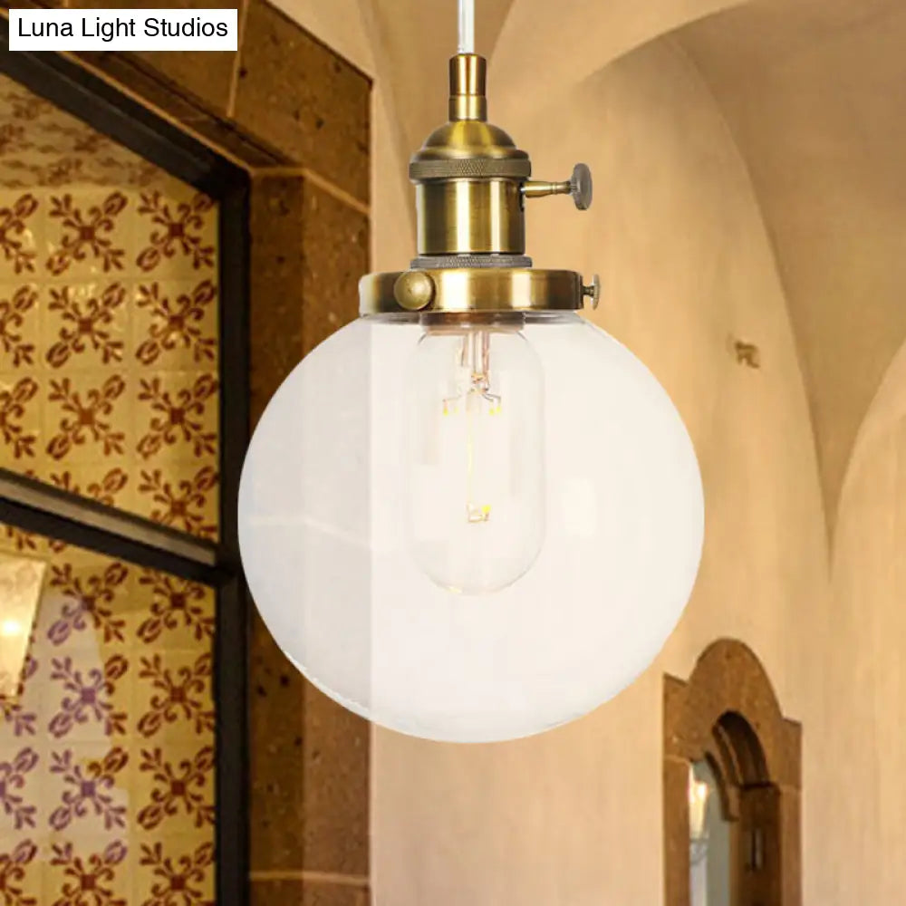 Farmhouse Orbit Pendant Light With Amber/Clear Glass And Adjustable Cord In 3 Elegant Finish