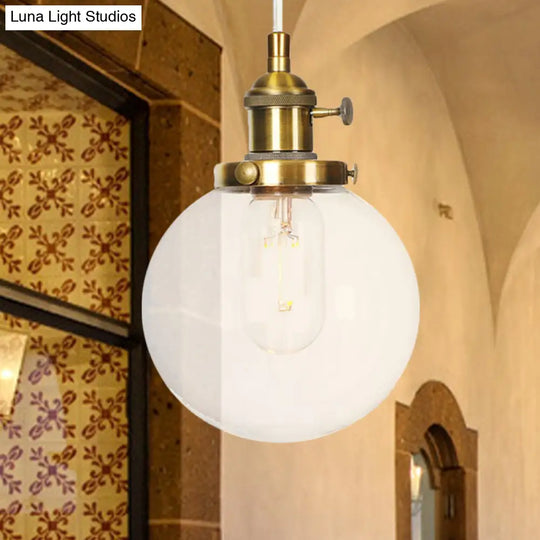 Farmhouse Orbit Pendant Light With Amber/Clear Glass And Adjustable Cord In 3 Elegant Finish