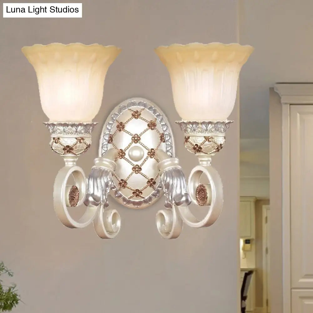 French Country Blossom Wall Sconce - Opaline Glass Lighting With Swirl Arm In Gold
