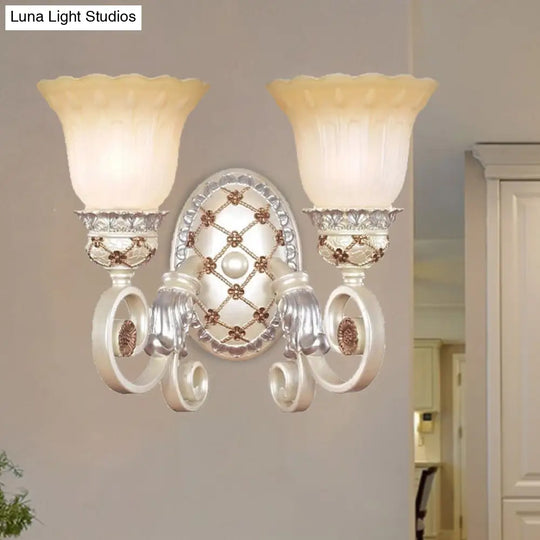 French Country Blossom Wall Sconce - Opaline Glass Lighting With Swirl Arm In Gold