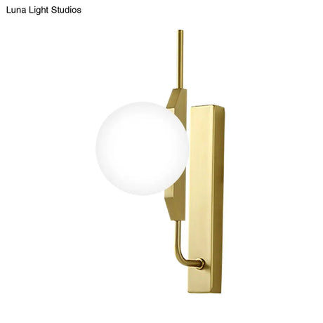 Globe Living Room Sconce - Frosted White Glass Modern Wall Light With Gold Backplate