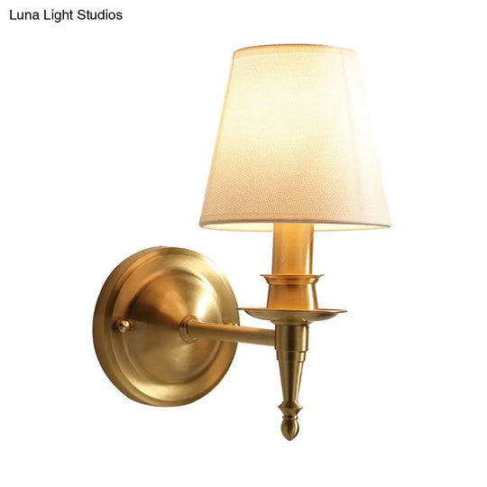 Gold Cone Wall Sconce With Single-Bulb Fabric Mount For Minimalist Lighting