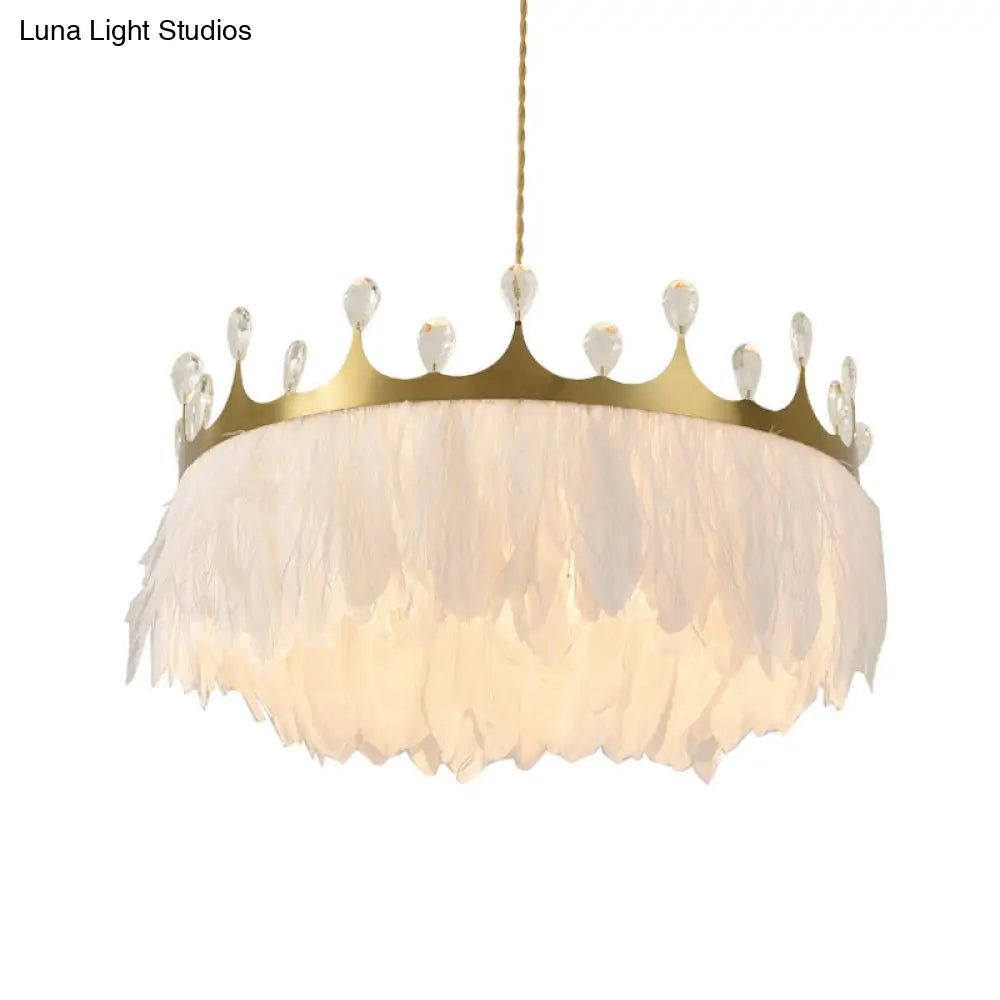Gold Crown Chandelier: Artistic Feather Suspension Light with Crystal Deco