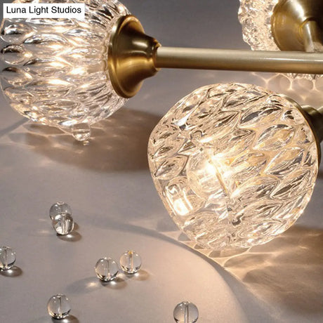 Gold Finish Chandelier With Metallic Branch Design And Clear Crystal Shade