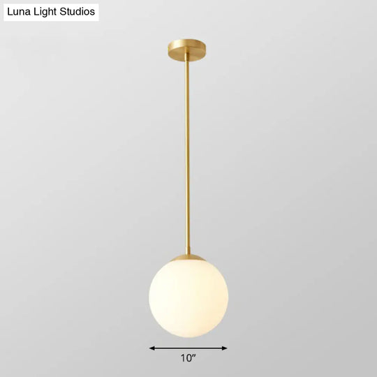 Gold Globe Pendant Light - Cream Glass 1-Light Simplicity Hanging Fixture / 10’ Downrods
