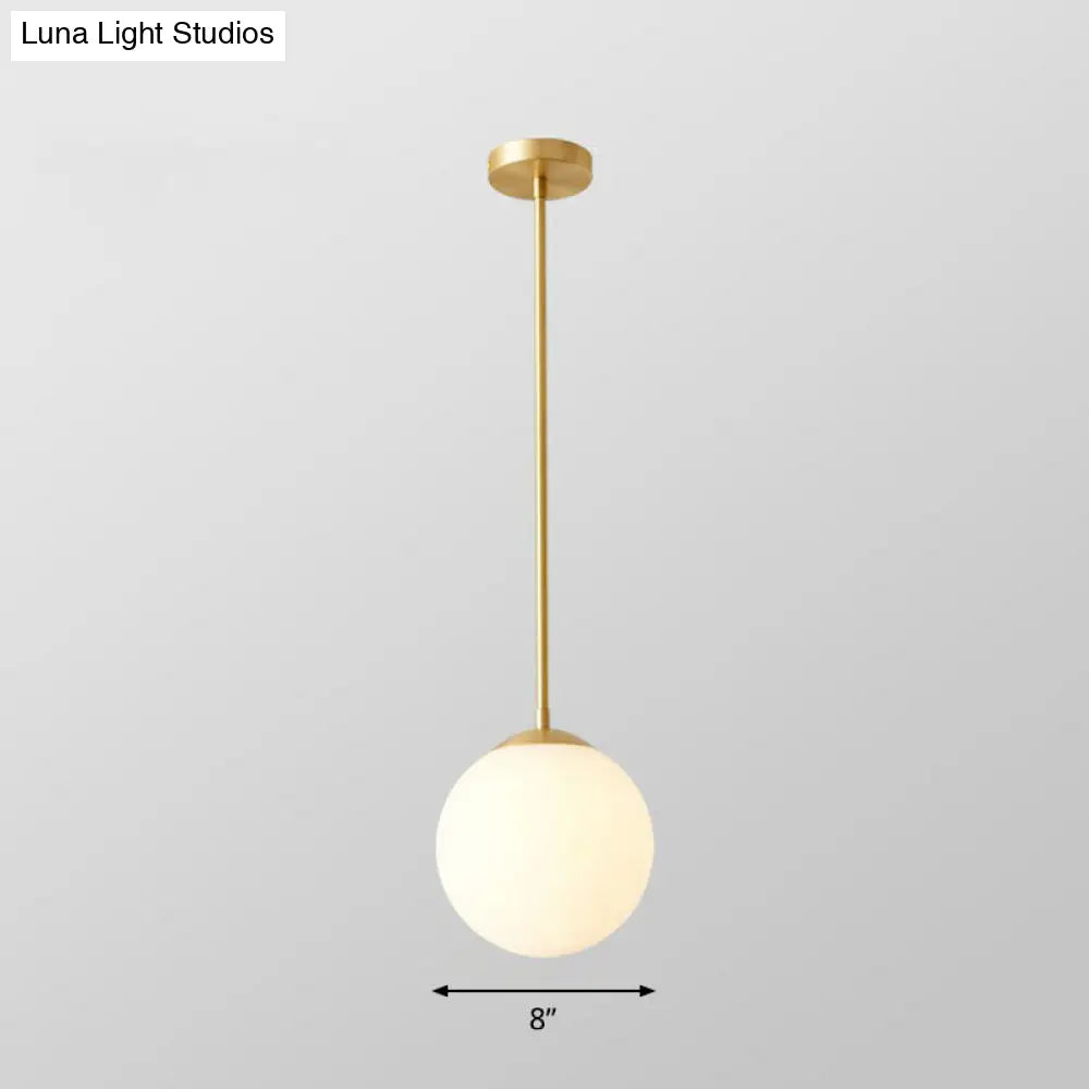 Gold Globe Pendant Light - Cream Glass 1-Light Simplicity Hanging Fixture / 8’ Downrods