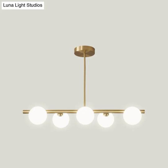 Gold Linear Island Pendant Light With Spherical Glass Shade - Perfect For Dining Table And