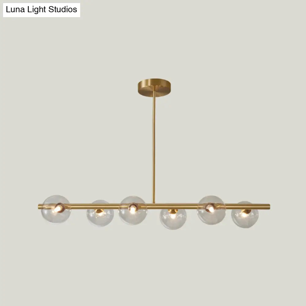 Gold Linear Island Pendant Light With Spherical Glass Shade - Perfect For Dining Table And