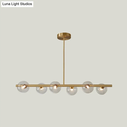Gold Linear Island Pendant Light With Spherical Glass Shade - Perfect For Dining Table And