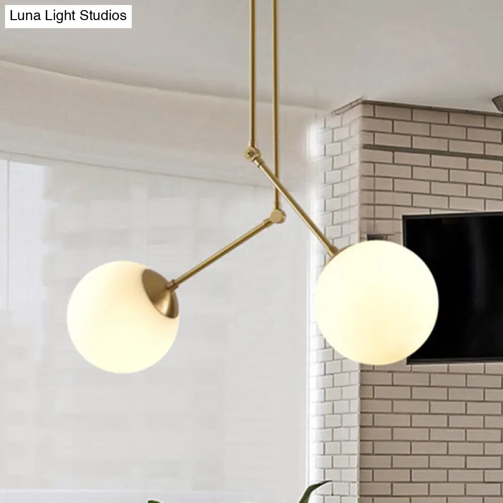 Height-Adjustable Milk Glass Orb Pendant Light In White & Brass For Cafes