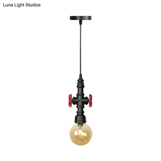 Industrial Black Finish Amber Glass Pendant Lamp With Pipe Suspension - 1-Light Ball/Capsule