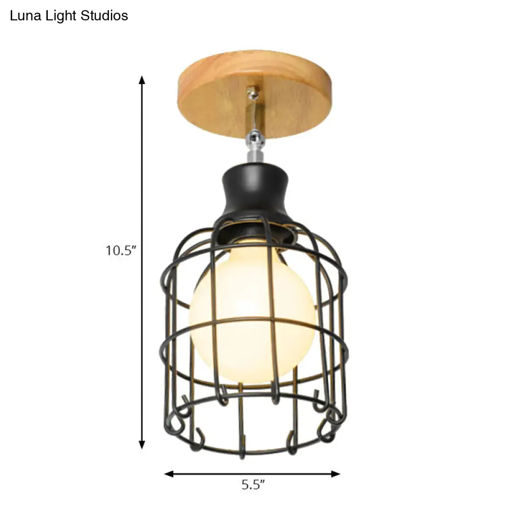 Industrial Loft Ceiling Fixture With Wire Cage And Rotatable Bulb - Black Metallic Semi-Flush Mount