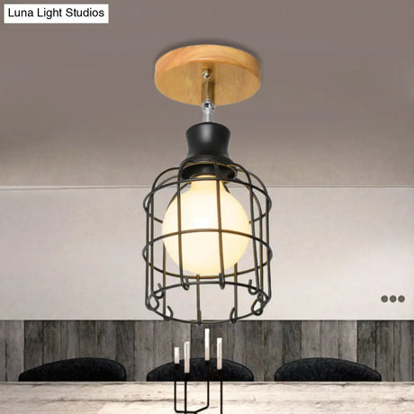 Industrial Loft Ceiling Fixture With Wire Cage And Rotatable Bulb - Black Metallic Semi-Flush Mount