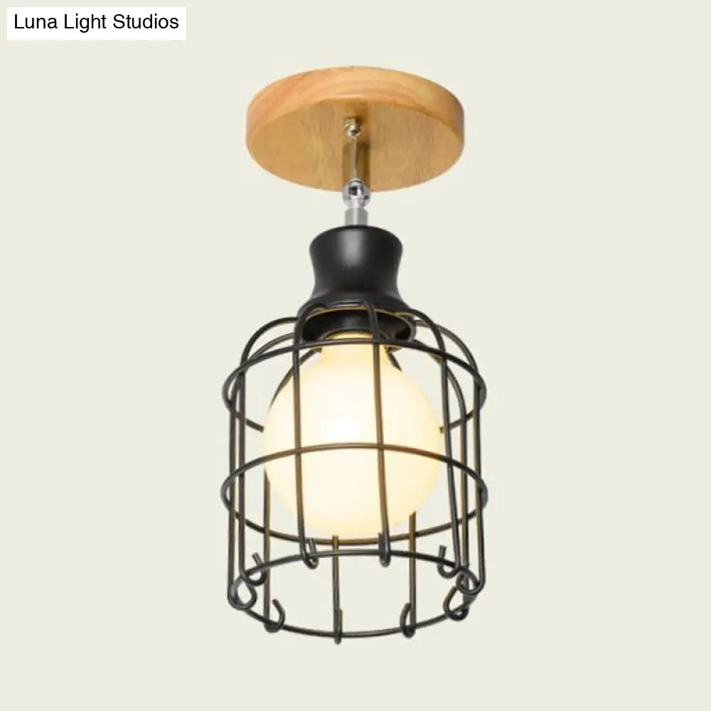 Industrial Loft Ceiling Fixture With Wire Cage And Rotatable Bulb - Black Metallic Semi-Flush Mount
