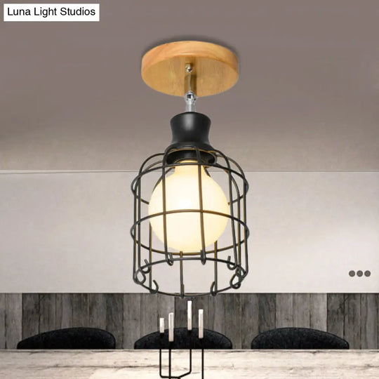 Industrial Loft Ceiling Fixture With Wire Cage And Rotatable Bulb - Black Metallic Semi-Flush Mount