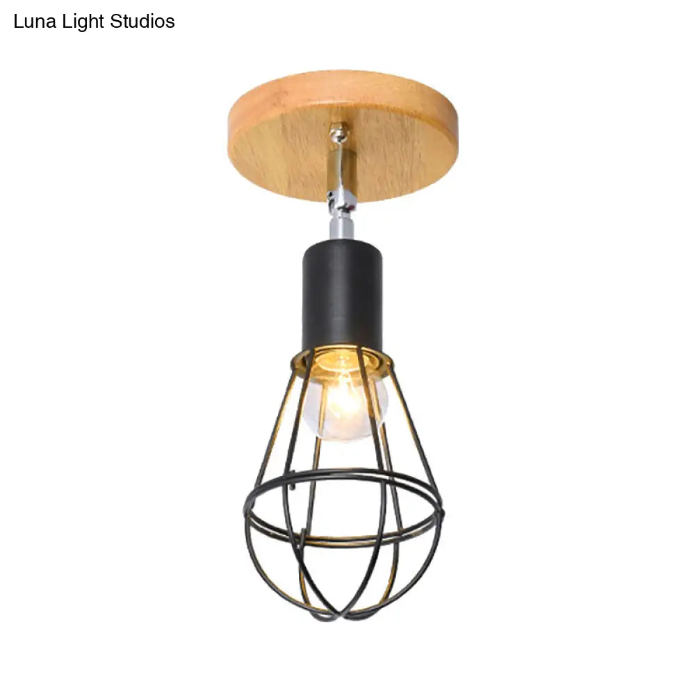 Industrial Loft Ceiling Fixture With Wire Cage And Rotatable Bulb - Black Metallic Semi-Flush Mount