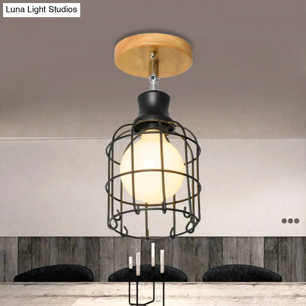 Industrial Loft Ceiling Fixture With Wire Cage And Rotatable Bulb - Black Metallic Semi-Flush Mount