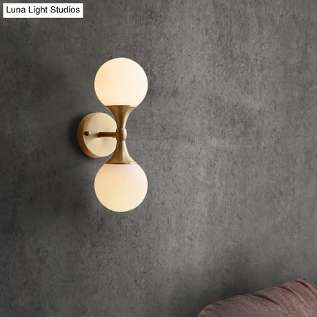 Ivory Glass Ball Wall Lamp With 2-Head Brass Sconce For Bedroom