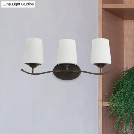 Ivory Glass Vanity Lighting With Iron Wavy Arm - Traditional Black Tapered Wall Light For Bedroom
