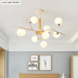 Japanese Style Multi-Head Glass Chandelier For Tea Station With White Spherical Shades