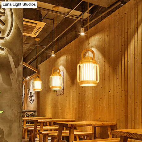 Japanese Style Single Bulb Pendant Light With Wood Cage And Fabric Shade