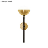 Metallic Hemisphere Wall Sconce With Orb White Glass Shade In Brass/Black And Gold - Traditional