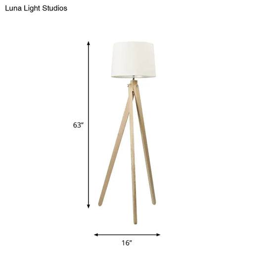 Minimalist Beige Tri-Leg Floor Lamp With Tapered Drum Shade - 1-Light Standing Light Fixture