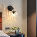 Minimalist Glass Ball Wall Lamp With Ripple Effect And Bent Arm In Black/Gold - Ideal For Bedroom