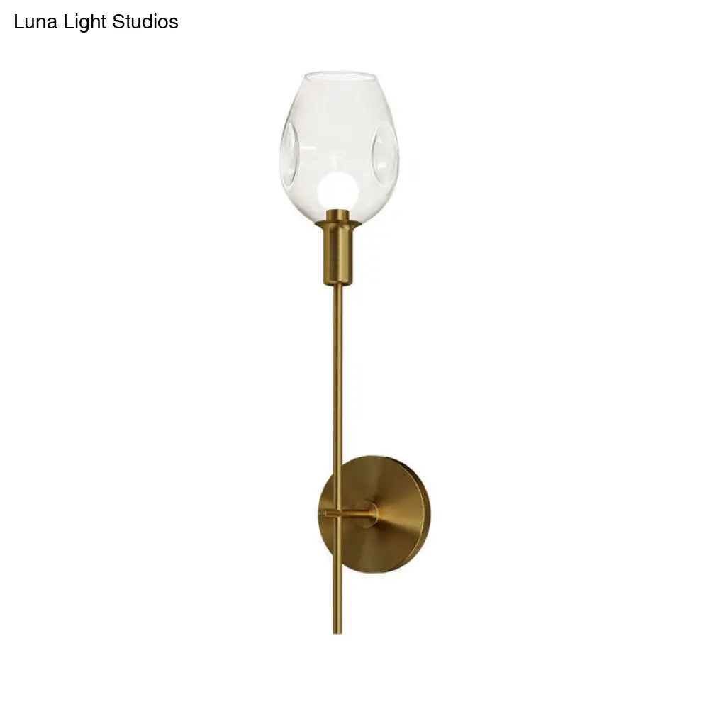 Minimalist Gold Sconce Wall Light With Clear Dimpled Cup And Pencil Arm For Hallway