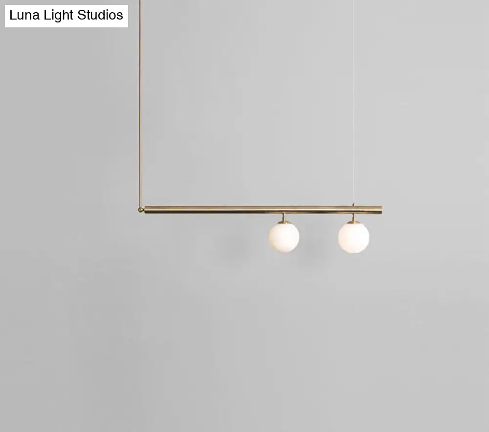 Minimalist Metal Pendant Lighting With Gold Accents - Modern Globe Glass Island Ceiling Light For