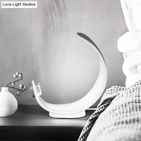 Minimalist Moon Shape Led Metallic Table Lamp With White Finish For Bedside Lighting