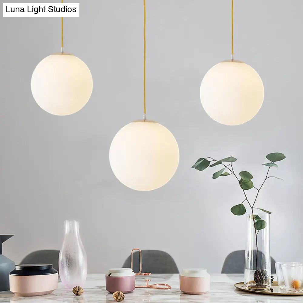 Minimalistic 1-Light Gold Pendant Light With Milky Glass Globe - Perfect For Dining Room