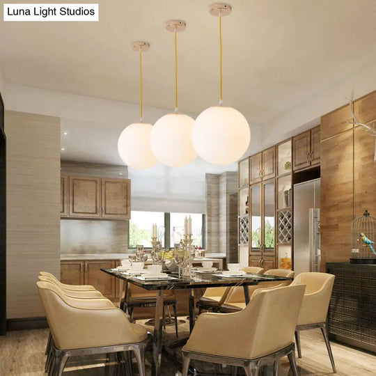 Minimalistic 1-Light Gold Pendant Light With Milky Glass Globe - Perfect For Dining Room