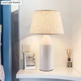 Modern 1-Head White Fabric Reading Lamp For Bedroom - Pencil Metallic Night Table Light