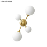 Modern 4-Light Sconce With Cream Glass Shade And Black/Gold Finish