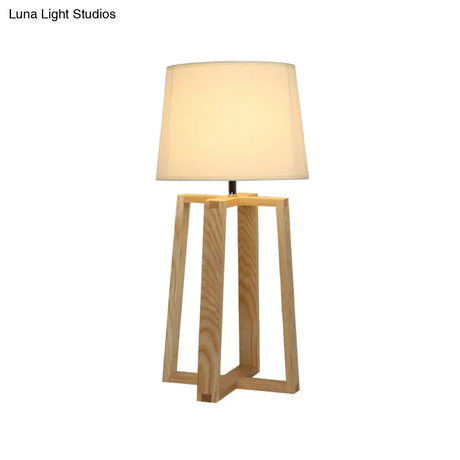 Modern Beige Trapezoid Nightstand Lamp With Wood Base And Tapered Fabric Shade