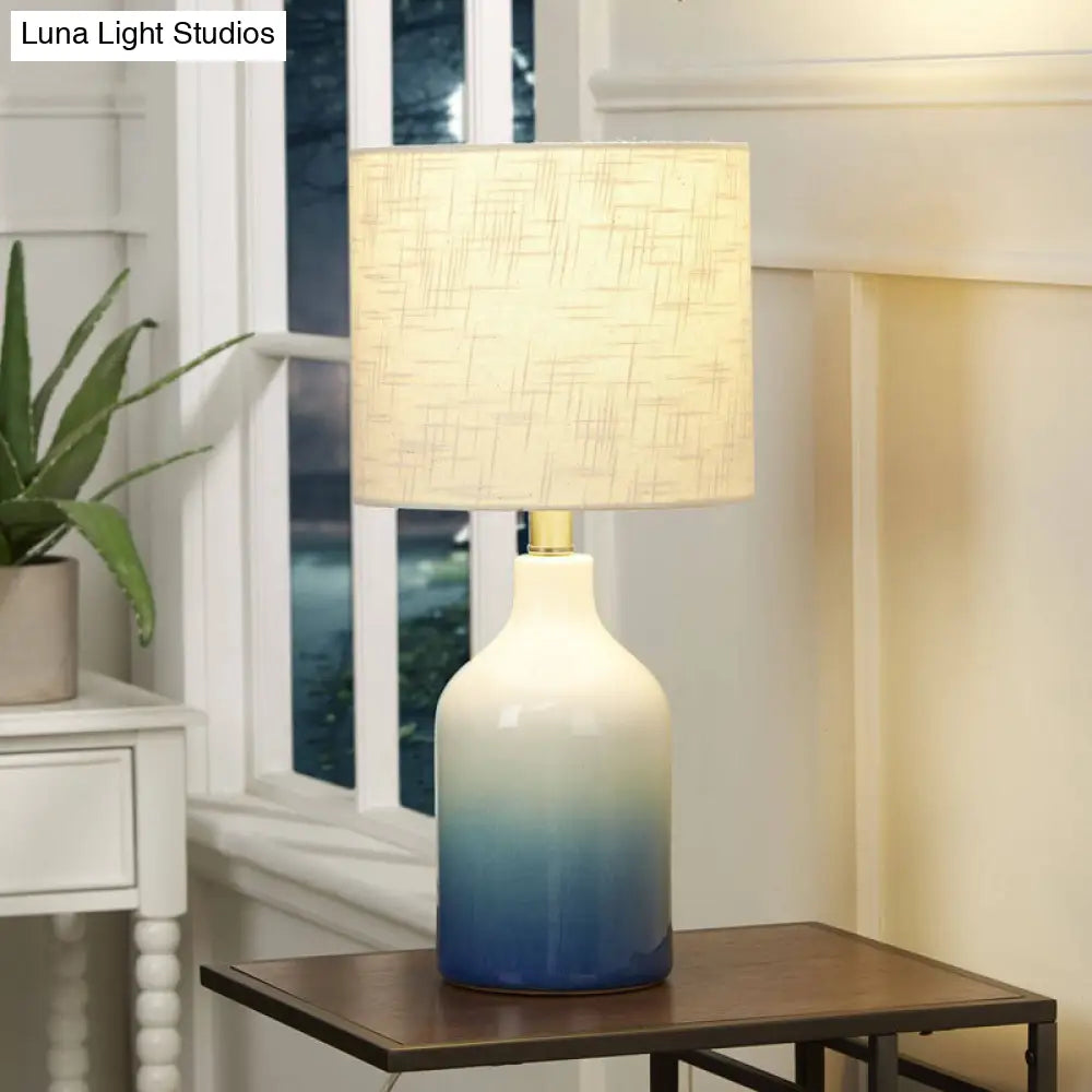 Modern Blue Ceramic Table Lamp - Urn Task Light With White Drum Shade