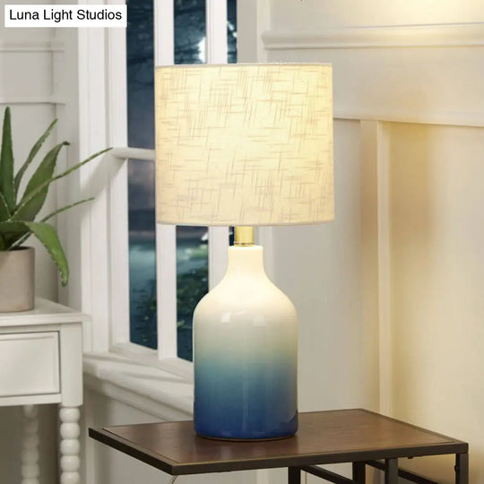 Modern Blue Ceramic Table Lamp - Urn Task Light With White Drum Shade