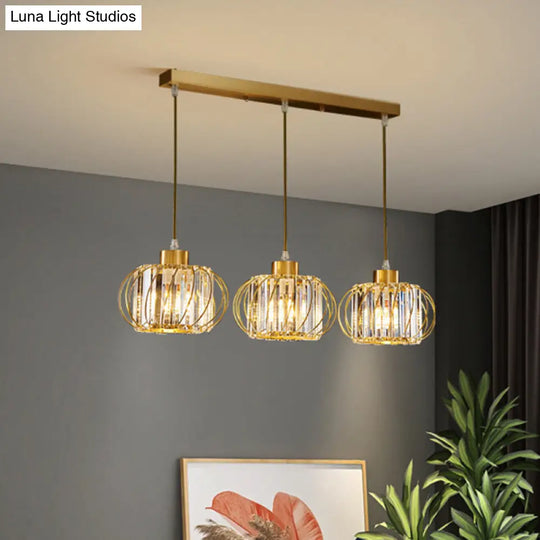 Modern Brass Globe Pendant Light With Crystal Accents Stylish Ceiling Lantern For Dining Area