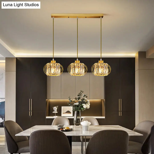 Modern Brass Globe Pendant Light With Crystal Accents Stylish Ceiling Lantern For Dining Area