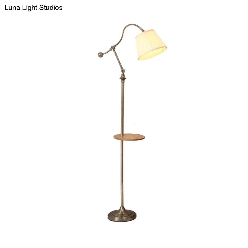 Modern Bronze Swing Arm Floor Lamp With Metallic Barrel Shade