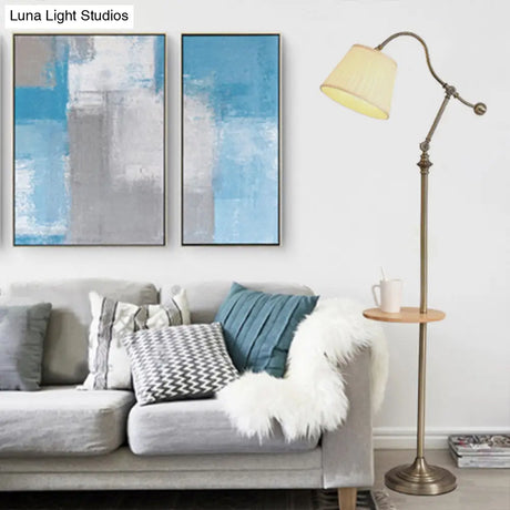 Modern Bronze Swing Arm Floor Lamp With Metallic Barrel Shade