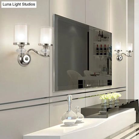 Modern Chrome Dual Cylinder Wall Mount Sconce With Curvy Arm - Simple Bathroom Lighting