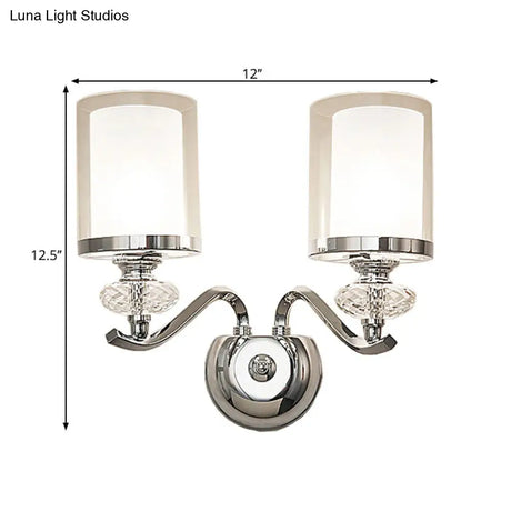 Modern Chrome Dual Cylinder Wall Mount Sconce With Curvy Arm - Simple Bathroom Lighting